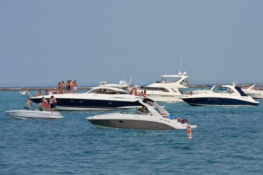 Party On Boats Anchored On Lake Michigan In Chicago clipart