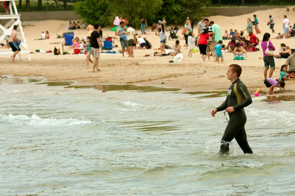 stock image Male Swimmer In Wetsuit Prepares To Swim Lake Michigan