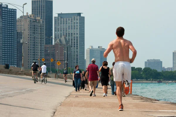 Stock image Being Active Along Lake Michigan Shoreline In Chicago