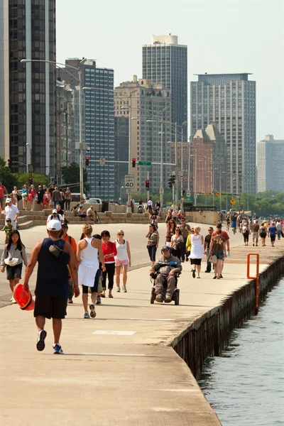 stock image Locals and Tourists Being Active Along Chicago Shoreline On Lake