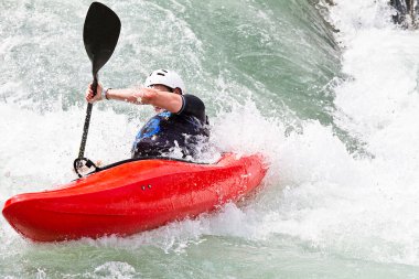 Kayak in white water clipart