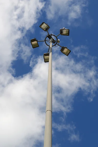 A six heads street lamp under blue sky