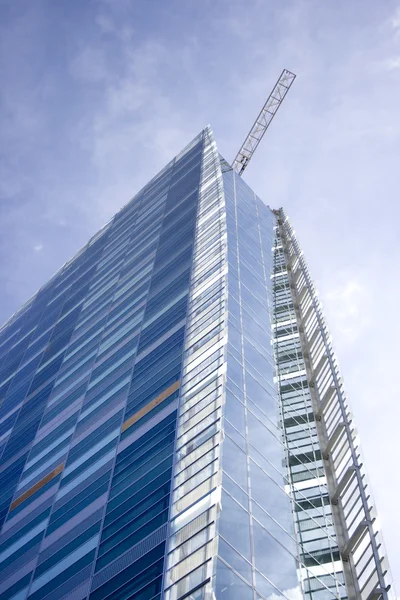 stock image Tall glass building in London.