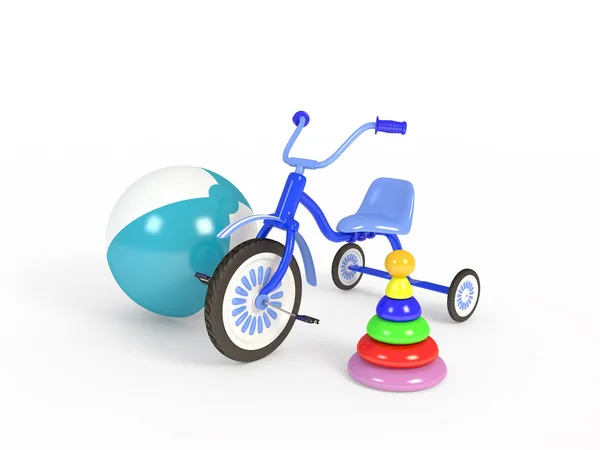 Изолированные шар, трехколесный велосипед и пирамида — стоковое фото