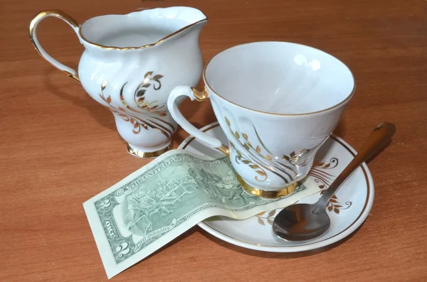 A couple of dollars for tea — Stock Photo, Image