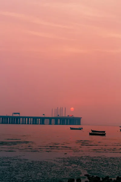 Sea-crossing bridge sunset — Stock Photo, Image