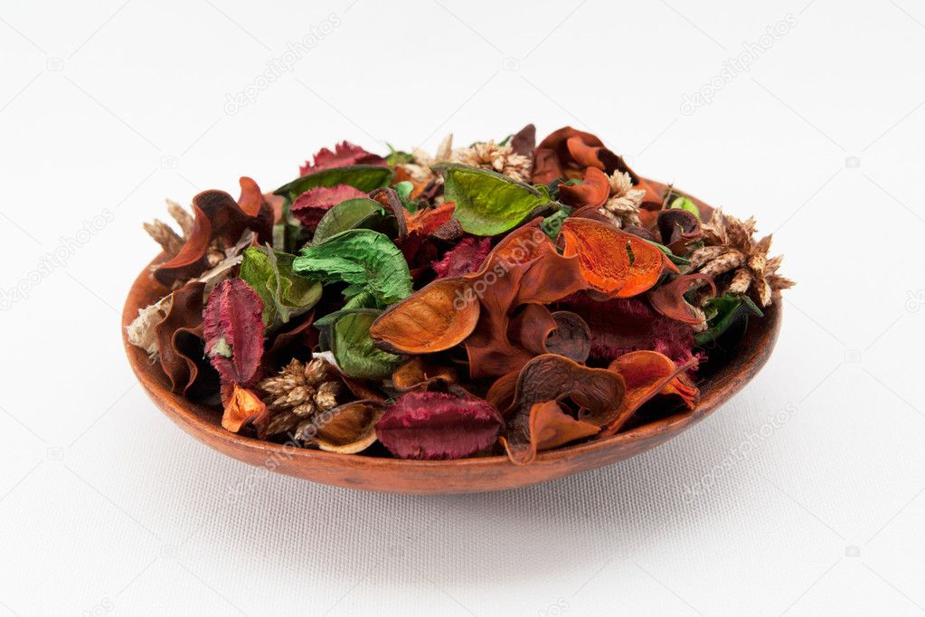 Dry tropical flowers on a plate