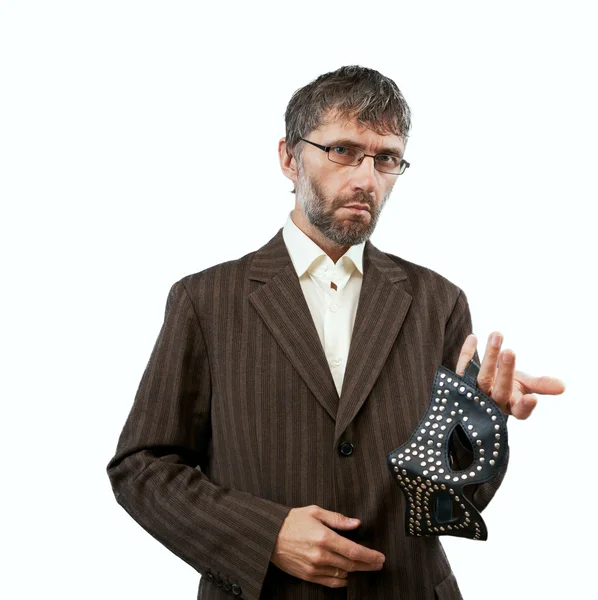 Man i kostym föreslår bdsm mask — Stockfoto