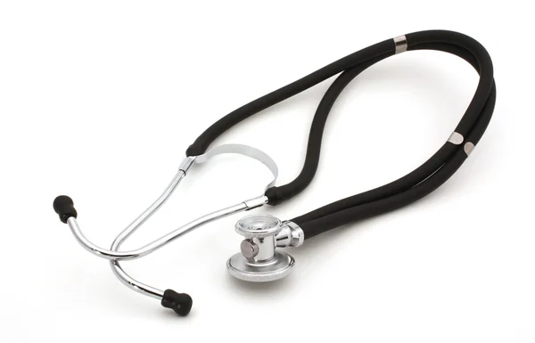 Stetoscop negru peste alb — Fotografie, imagine de stoc
