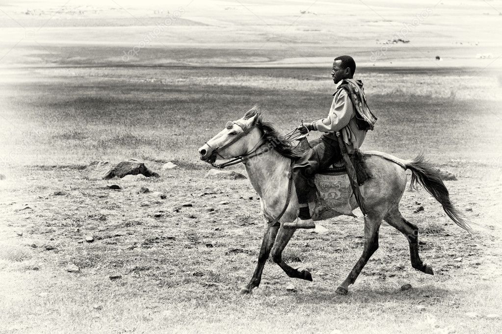 Clipart ethiopia Ethiopian rides a horse in the field of Ethiopia