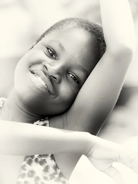 Young Ghanaian girl poses and dances for the camera — Stock Photo, Image