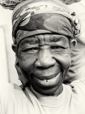 Smiling old lady in Ghana clipart