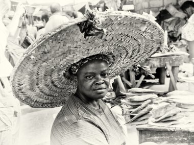 A Ghanaian lady in a very huge hat clipart