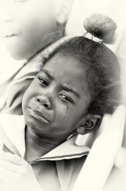 A portrait of a crying Ghanaian girl clipart