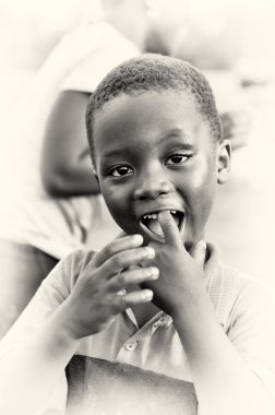 A portrait of Ghanaian boy with open mouth clipart