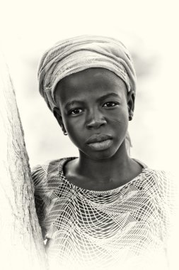 A lady from Ghana poses for the camera clipart