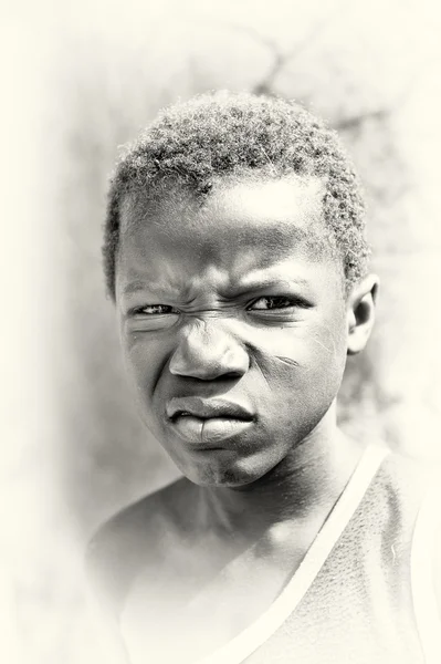 Screwed face of a Ghanaian boy — Stock Photo, Image