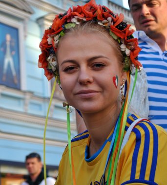 Beautiful Ukrainian girl which supports her national team clipart