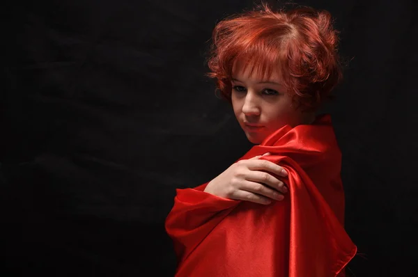 Dívka v červené barvě — Stock fotografie