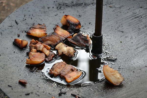 Assados de porco no fogo Fotos De Bancos De Imagens Sem Royalties
