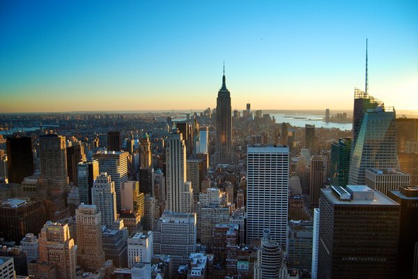 Sunset in new York, touring the Big Apple. Image of the city. Buildings in Manhattan.