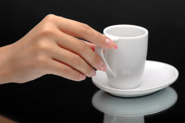 Hand hält eine Kaffeetasse — Stockfoto