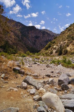 Mountains creekbed, sky and clouds at Big Rock Canyon, southern California clipart