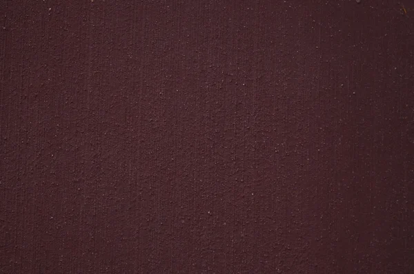 Текстурований темно-фіолетовий червоний бетон — стокове фото