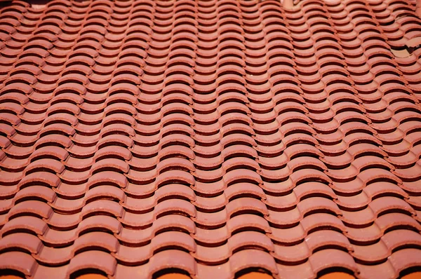 Rode klei tegels dak patroon Stockafbeelding