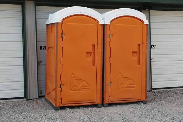 stock image Two orange Porta Pottys