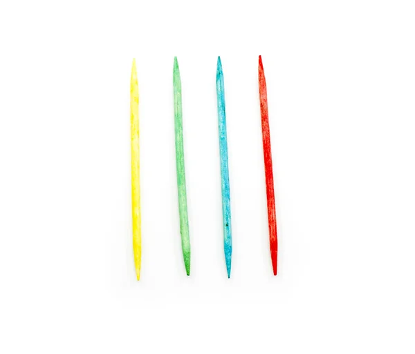 Cuatro palillos de dientes coloridos — Foto de Stock