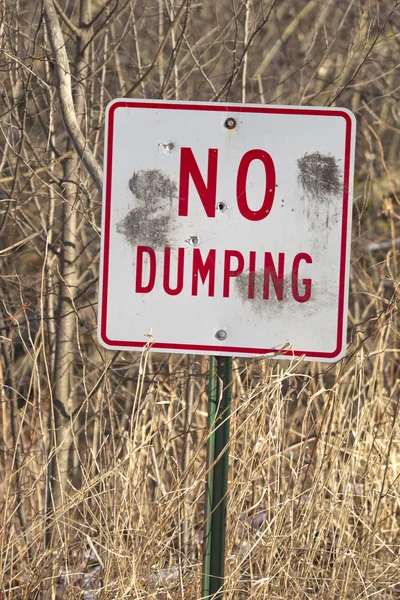 No Dumping Sign with Gun Shot Holes — Stock Photo, Image