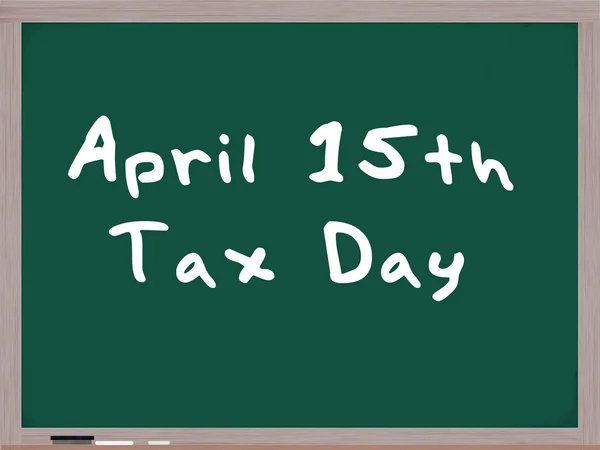 15 de abril Día del Impuesto escrito en pizarra — Foto de Stock