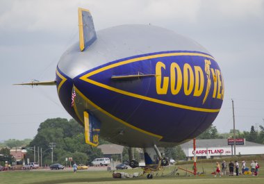 Goodyear Blimp readying for flight side view clipart