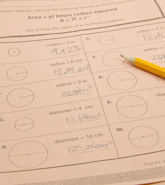 Домашняя работа по математике 6-го класса Пи — стоковое фото