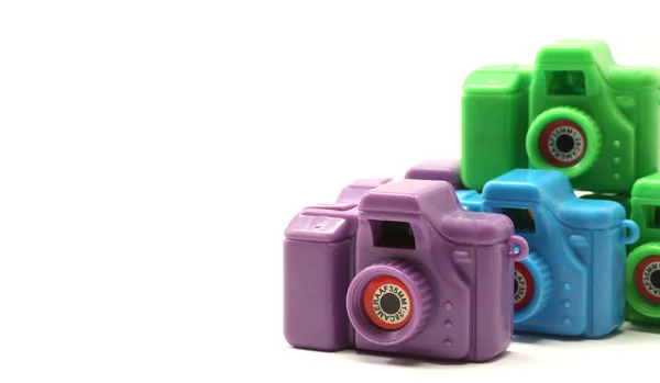 Cámaras de juguete azul y verde púrpura con espacio de copia —  Fotos de Stock