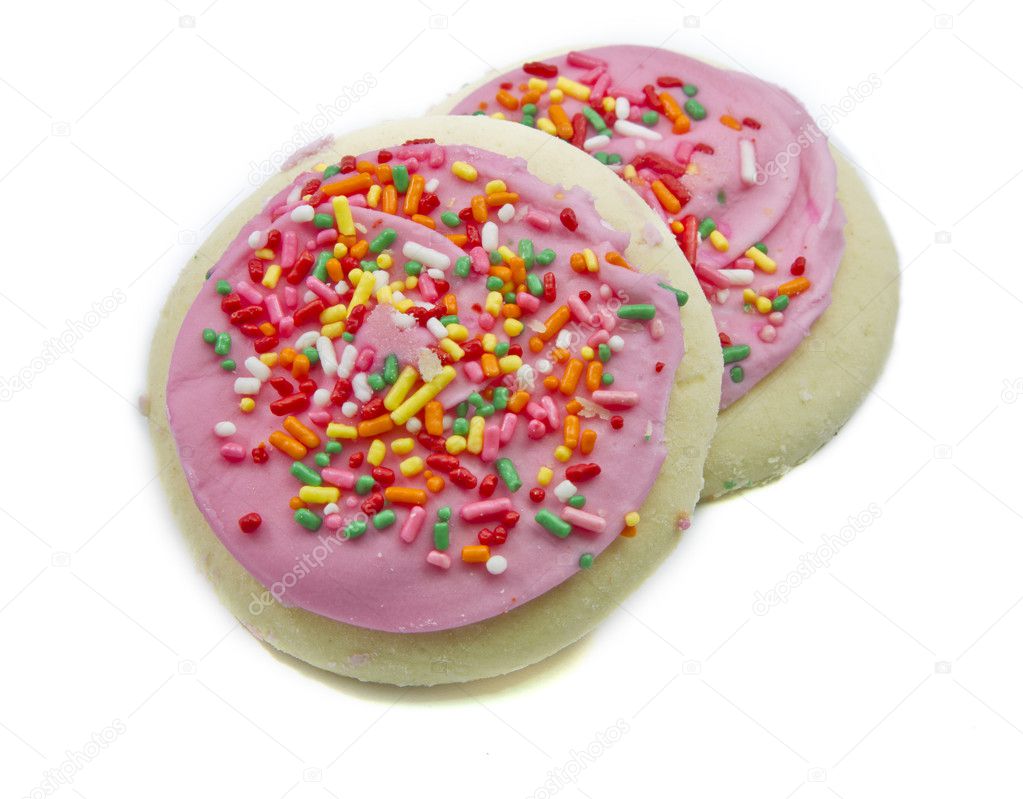Two pink and sprinkles sugar cookies