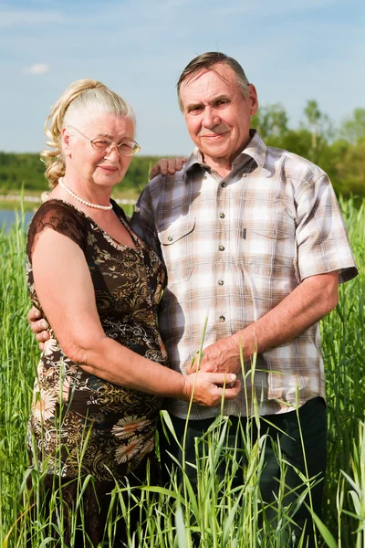 Closeup portrait of a smiling elderly couple — Stock Photo, Image