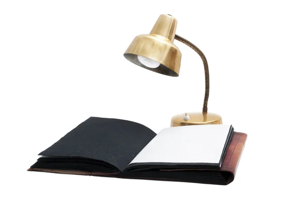 Desk lamp and old book — Stock Photo, Image