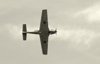 Old fighter airplane in black and white clipart