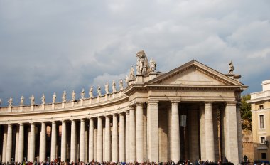 Colonnade at Saint Peter's squate in the Vatican clipart