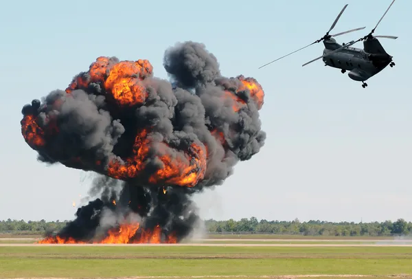 Helicopter over fite — Stock Photo, Image
