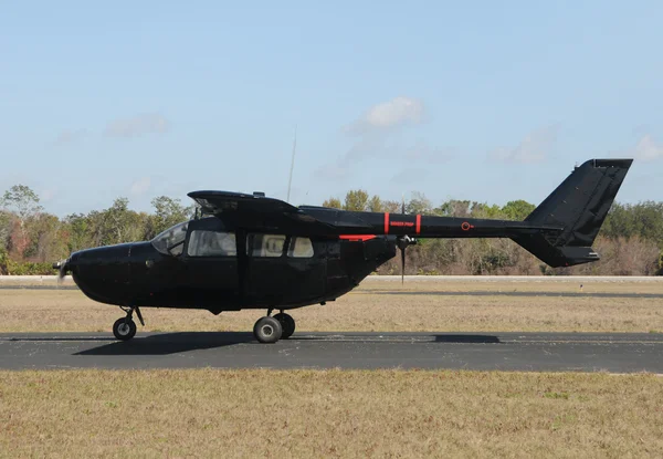 Black airplane — Stock Photo, Image