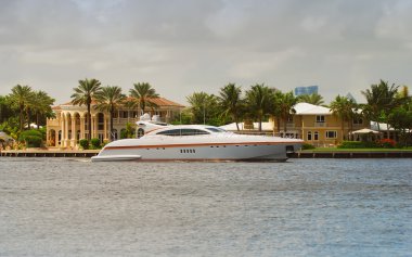 Luxurious yacht on a Florida waterway clipart