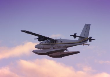 Seaplane at dawn clipart