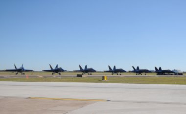 Navy jets parked on the ground clipart