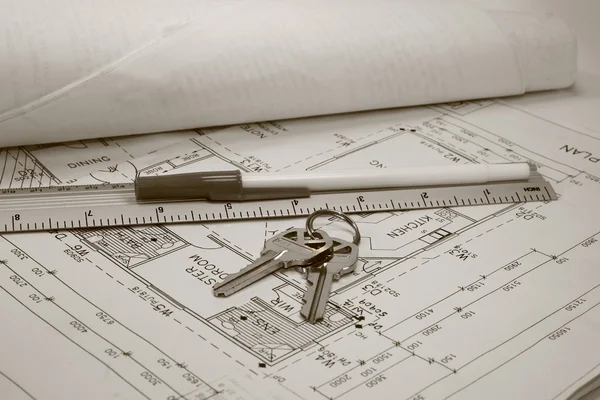 Plans and ruler and keys — Stock Photo, Image