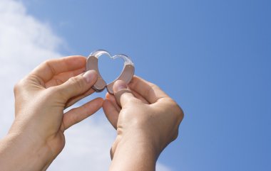 Showing a heart from hearing aids