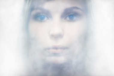 Picture a beautiful angelic woman in the fog clipart