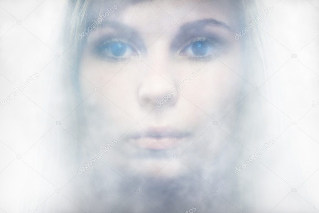 Picture a beautiful angelic woman in the fog